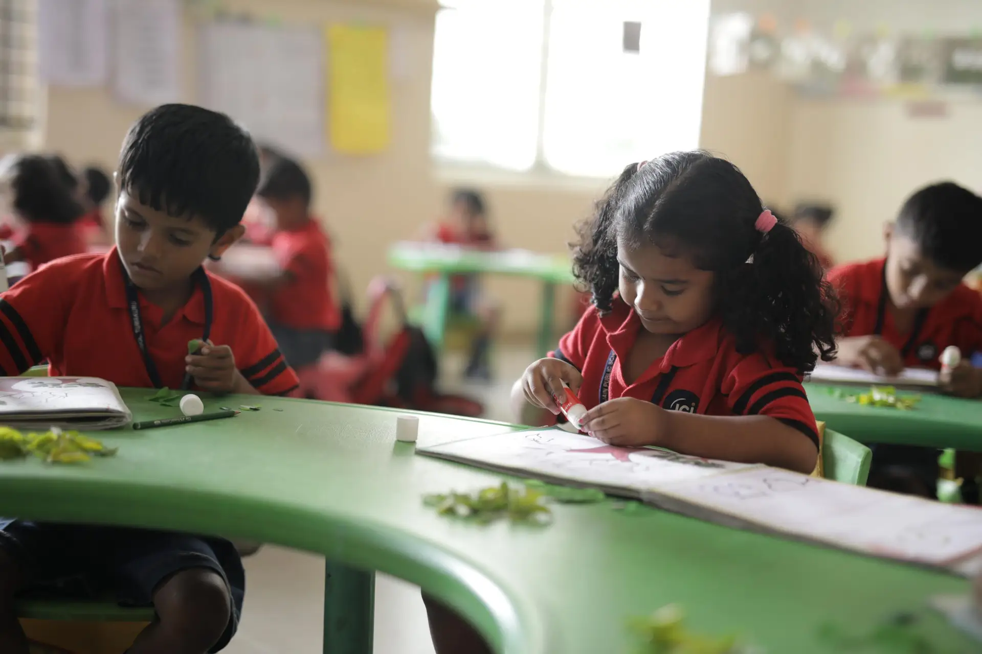 Students working together in the creative environment at Jain Public School